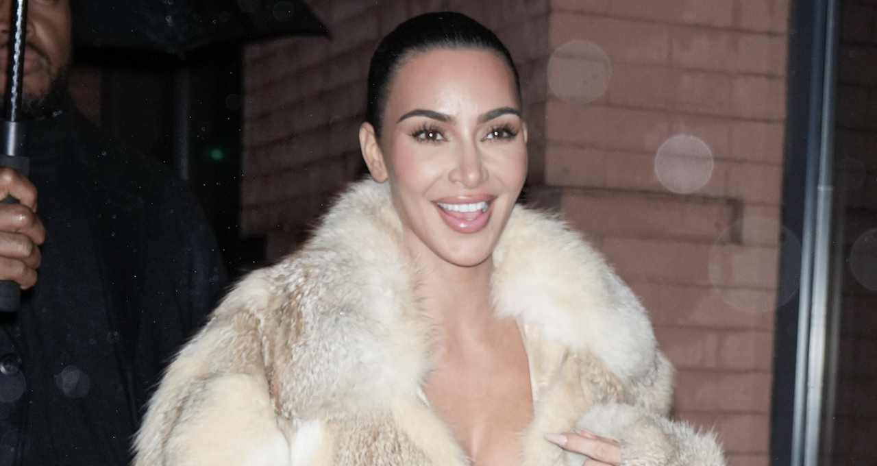 Kim Kardashian arrives at the 60th birthday of Chris Rock also attended by her ex Pete Davidson at the Crane Club in New York City. Kim wore a revealing all cream bodysuit with a fur coat and heels. Pete appeared to be in high spirits flashing a peace sign and a thumbs up as he made his way into the venue.