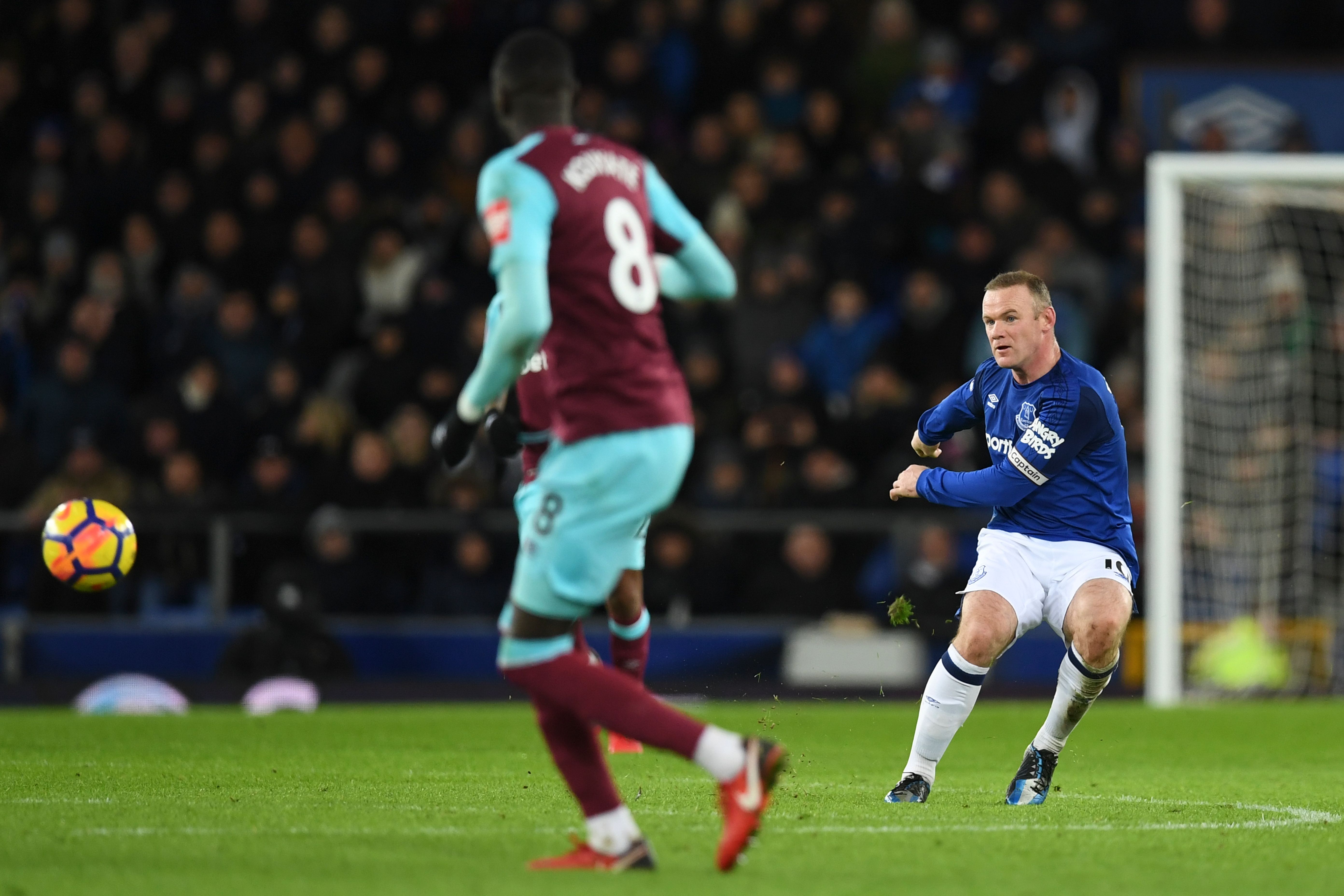 Wayne Rooney shoots to score from his own half for Everton against West Ham, 2017