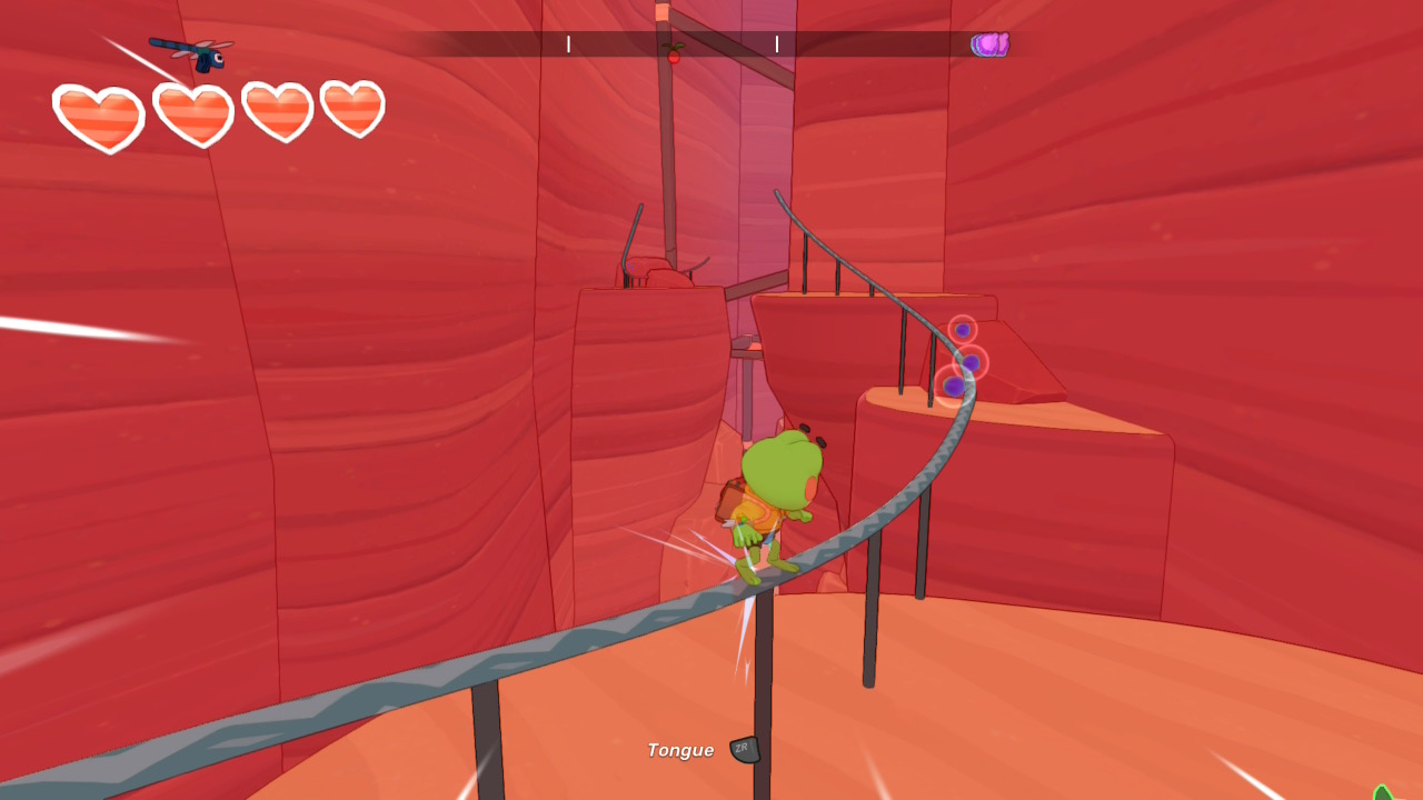 Pantalla colorida de un juego de plataformas retro protagonizado por una rana