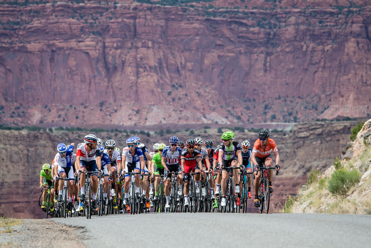 Discussions on the front of the peloton heading into the final lap