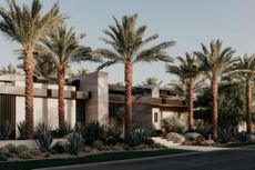 gardens & villas house, single storey luxury desert home behind palm trees