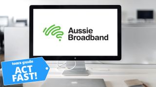 Aussie Broadband logo on desktop screen with Tom's Guide Act Fast deal badge on bottom left corner