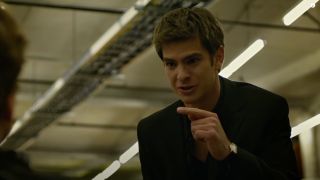 Andrew Garfield yelling and pointing his finger at Jesse Eisenberg in The Social Network.