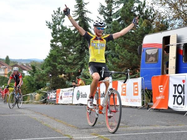 Winner of the Junior men's category crosses the line.