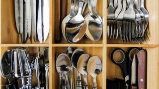 Cutlery in a drawer divider