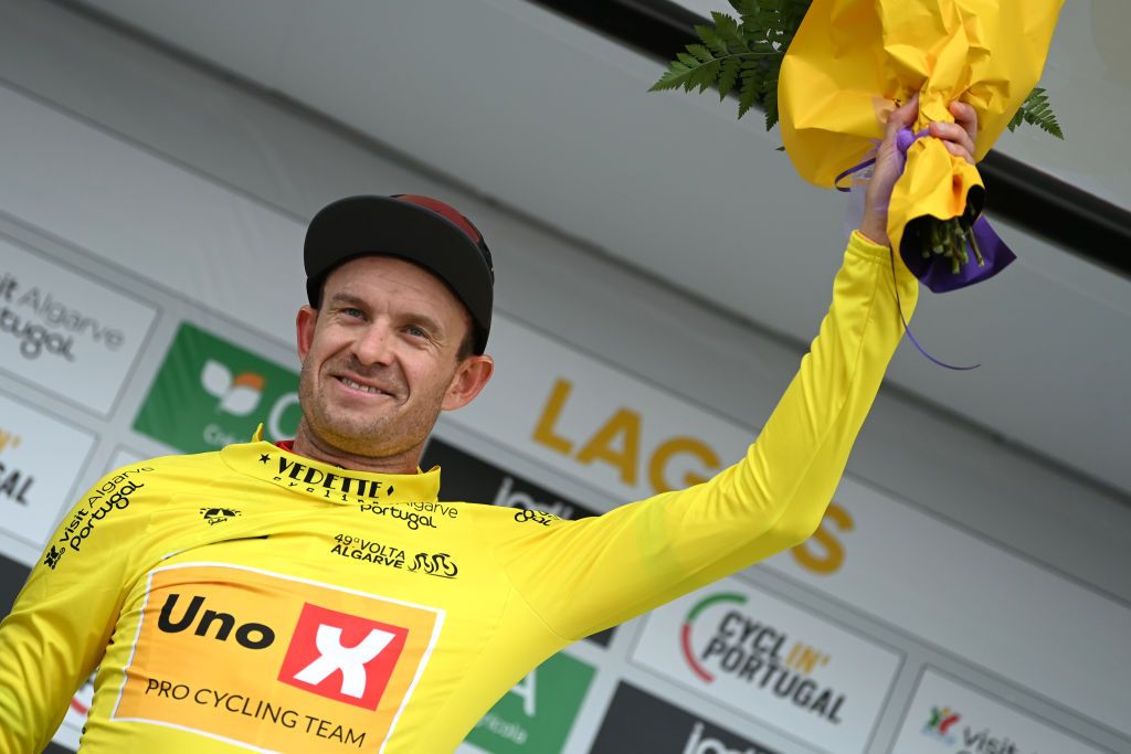 LAGOS PORTUGAL FEBRUARY 15 Alexander Kristoff of Norway and UnoX Pro Cycling Team celebrates at podium as Yellow Leader Jersey winner during the 49th Volta ao Algarve em Bicicleta 2023 Stage 1 a 2002km stage from Portimo to Lagos VAlgarve2023 on February 15 2023 in Lagos Portugal Photo by Tim de WaeleGetty Images