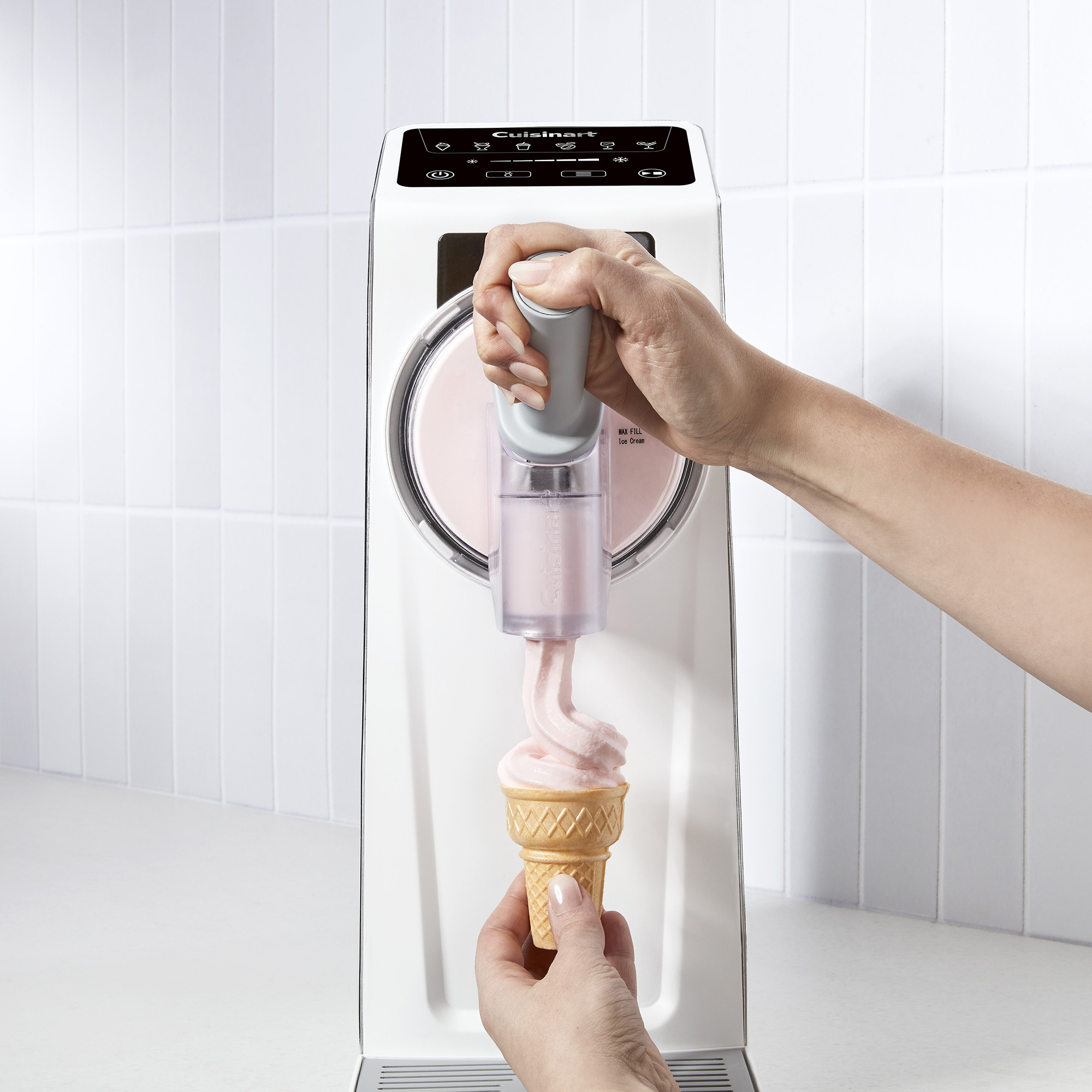 Cuisinart slushie and soft serve machine with various drinks and ice creams around it in a promotional image
