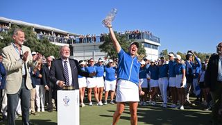 eam Europe captain Suzann Pettersen celebrates with the Solheim Cup after her teams win during Day Three of The Solheim Cup at Finca Cortesin Golf Club on September 24, 2023 in Casares, Spain