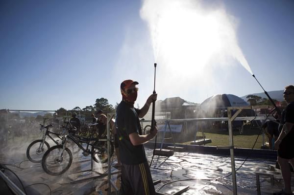 Bike washers at work during the 2012 Absa Cape Epic Mountain Bike stage race