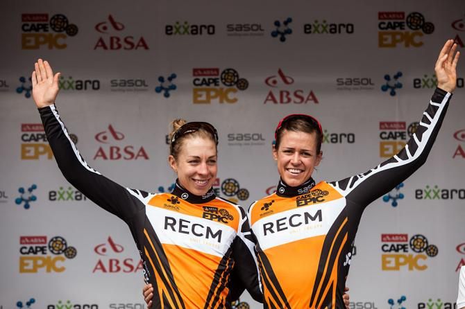 Ariane Kleinhans (R) and Annika Langvad (L) celebrate after winning stage