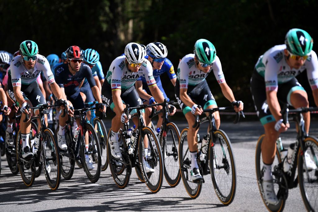 FOLIGNO ITALY MAY 17 Daniel Oss of Italy and Team Bora Hansgrohe Nicolas Jonathan Castroviejo of Spain and Team INEOS Grenadiers Peter Sagan of Slovakia and Team Bora Hansgrohe Mikkel Honore of Denmark and Team Deceuninck QuickStep during the 104th Giro dItalia 2021 Stage 10 a 139km stage from LAquila to Foligno girodiitalia Giro on May 17 2021 in Foligno Italy Photo by Tim de WaeleGetty Images