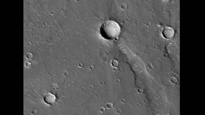 A portion of Mars' Utopia Planitia impact basin, as photographed by the HiRISE camera aboard NASA's Mars Reconnaissance Orbiter. China's Tianwen-1 Mars rover will touch down in a section of Utopia Planitia in 2021.