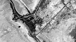 black and white images of terrain on earth, taken from space. Satellite images from 1974 of Iraq, later found as the location of the al-Qadisiyyah battle site