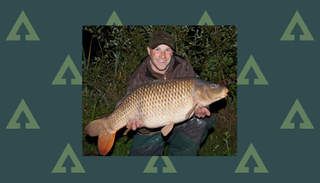 How to catch carp on bread - Colin Davidson holding a carp caught using bread