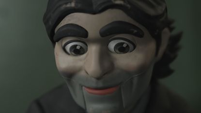 Dollman is lost in thought in Death Stranding 2: On the Beach