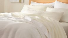 Bed with white sheets