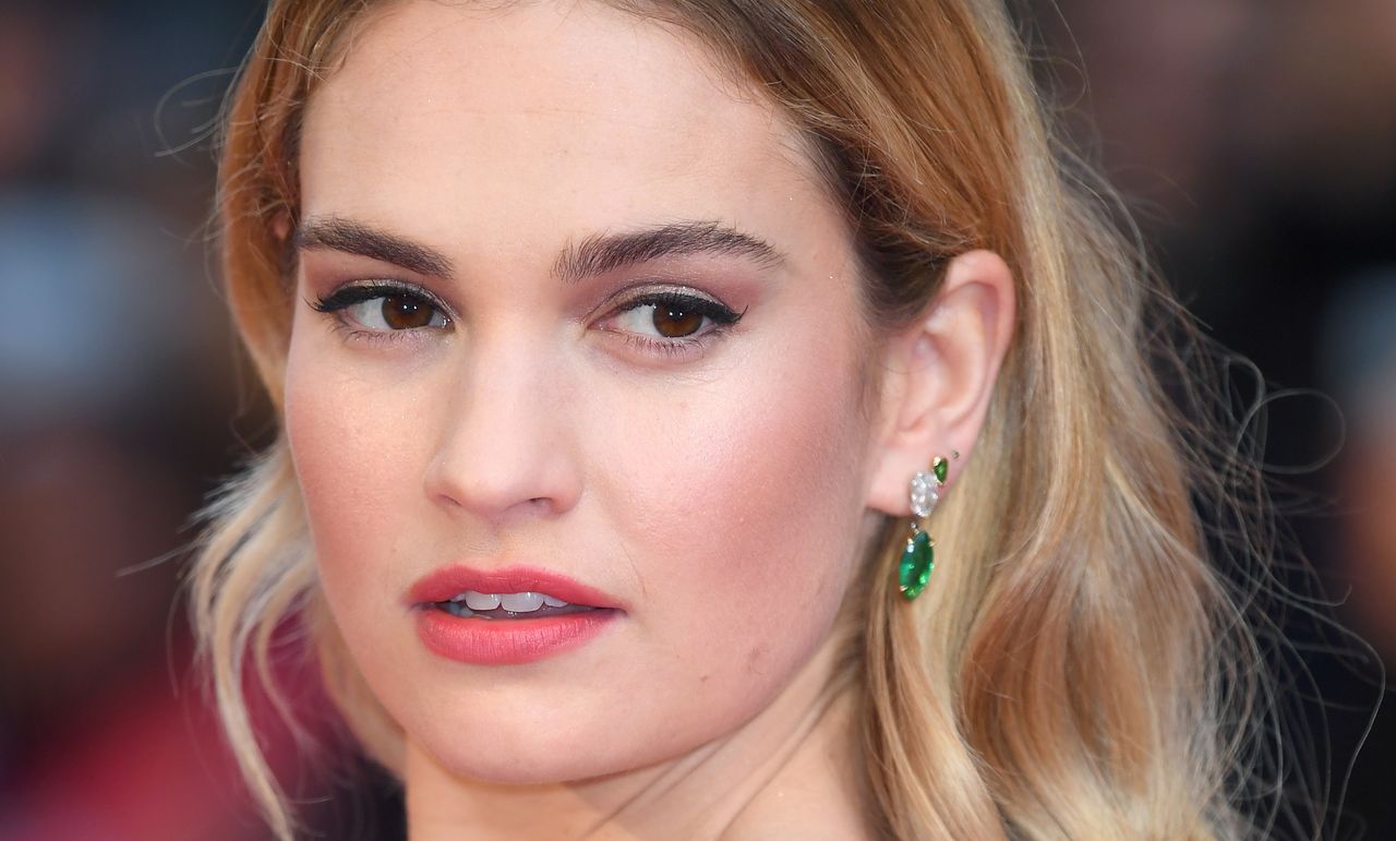  Lily James attends &#039;The Guernsey Literary And Potato Peel Pie Society&#039; World Premiere at The Curzon Mayfair on April 9, 2018 in London, England