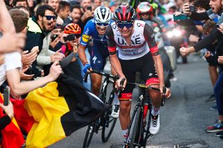 Tadej Pogacar attacks Fausto Masnada on the climb to Bergamo during the 2021 Il Lombardia