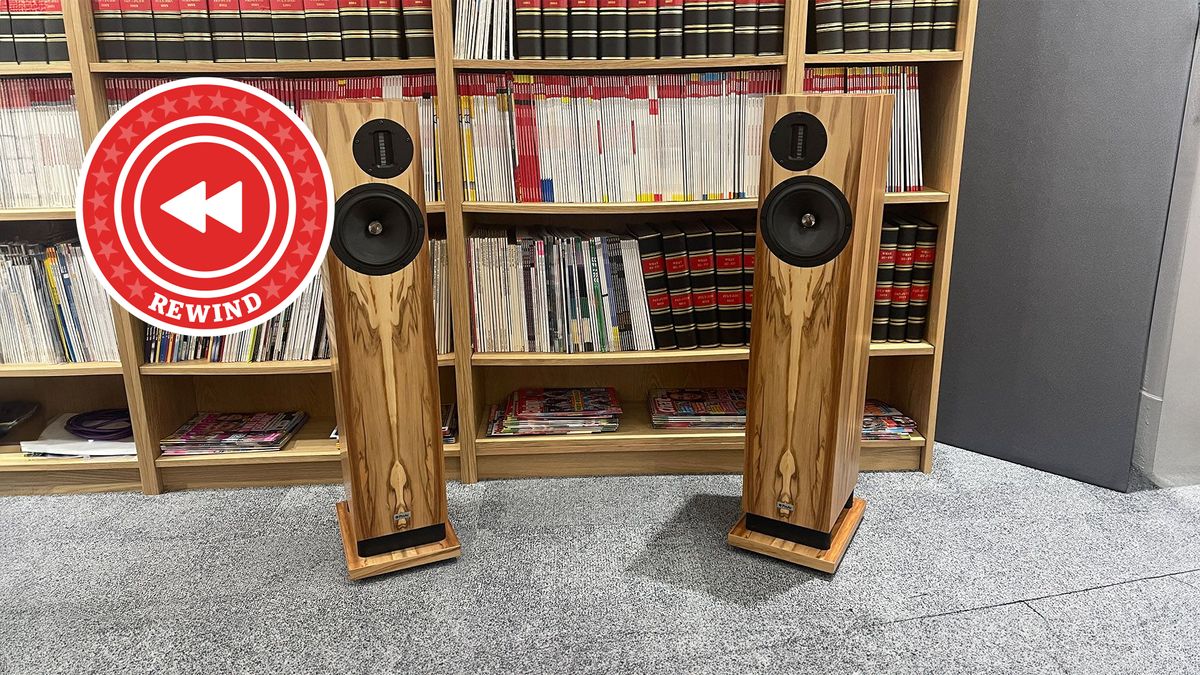 Wooden speakers in listening room with Rewind logo