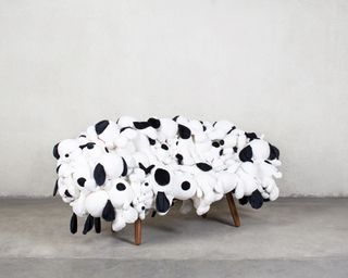 Sofa made of soft toy dogs, by Estudio Campana for Kaws