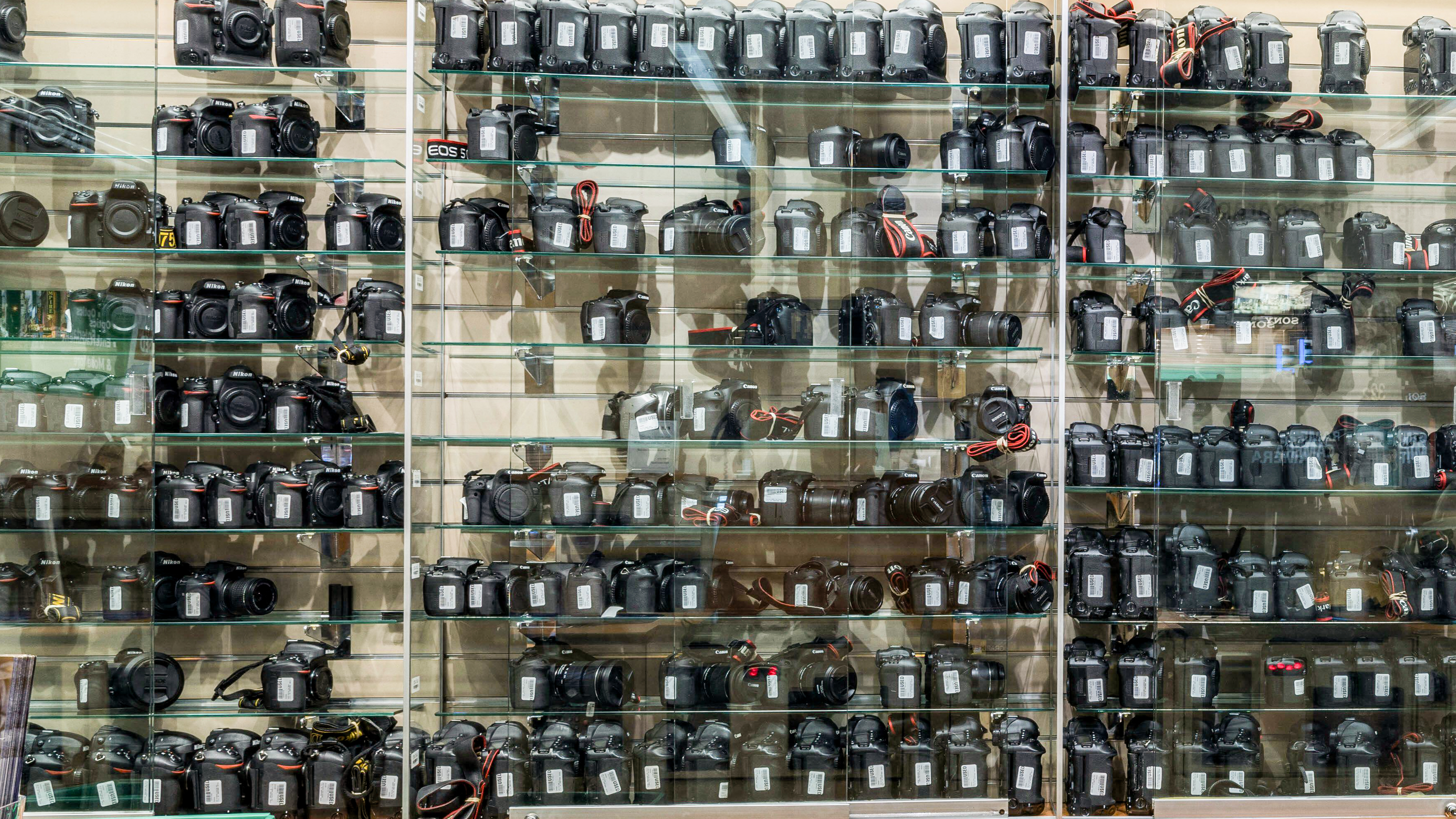 2K7P6P0 Beautiful shop interior BH Photo Video c view of the shelves with photo and video cameras. USA, New York.