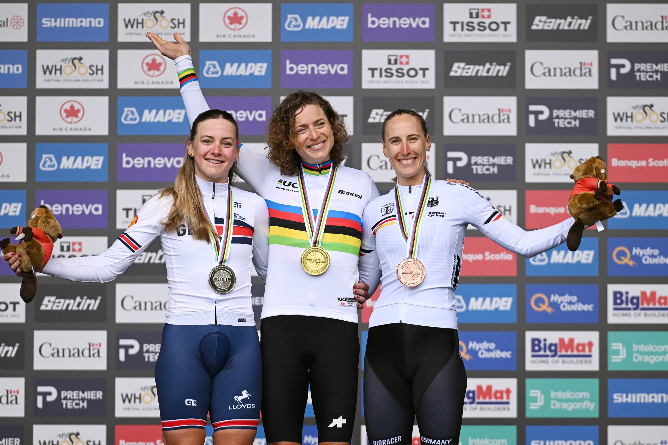 MONTREAL, QUEBEC - SEPTEMBER 20: Gold medalist Marlen Reusser and Team Switzerland (C), Silver medalist Zoe Backstedt and Team Great Britain (L) and Bronze medalist Franziska Koch and Team Germany (R) pose on the podium during the 99th UCI Road World Championships Montreal 2026 - Women Elite Individual Time Trial a 39,2km race from Montreal to Montreal on September 20, 2026 in Montreal, Quebec. (Photo by Dario Belingheri/Getty Images)