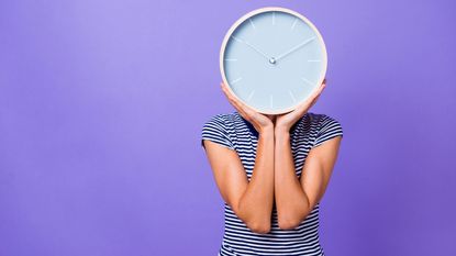 A woman has a clock for a head in a photo illustration.