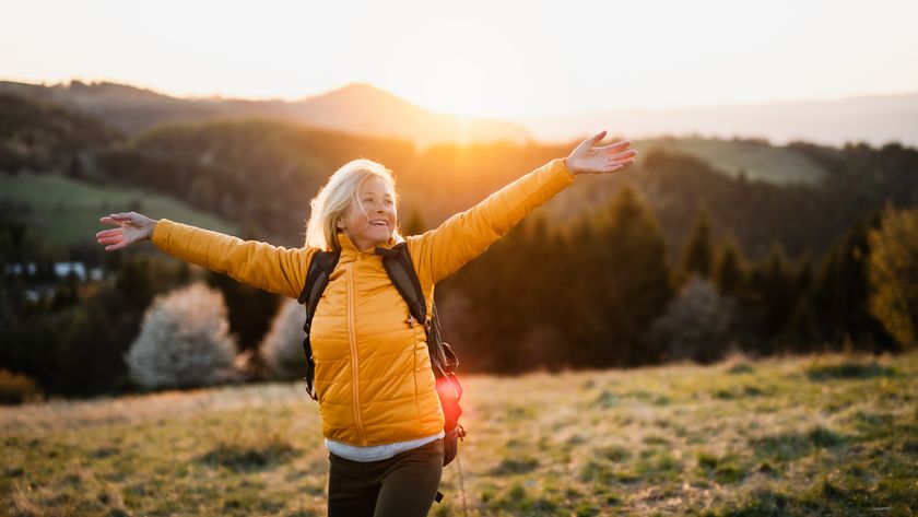a photo of an older woman walking
