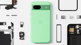 The Aloe Google Pixel 8a alongside recycled materials