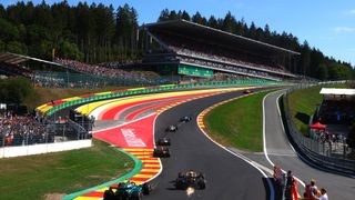 A general view of the start of the race as cars make their way up Eau Rouge during the F1 Belgium Grand Prix at Circuit de Spa-Francorchamps 