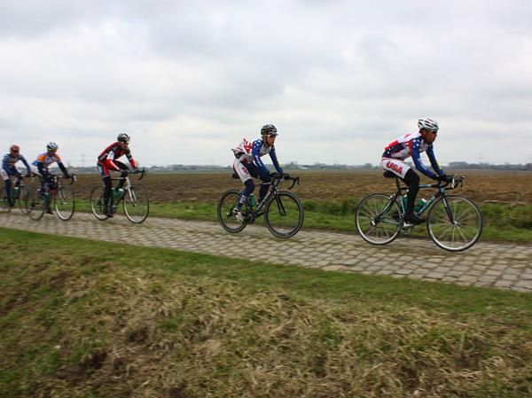 US development riders drag a few locals along for the ride.