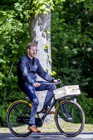 the hague, netherlands may 09 prince harry, duke of sussex rides a bicycle during the launch of the invictus games on may 9, 2019 in the hague, netherlands photo by patrick van katwijkwireimage