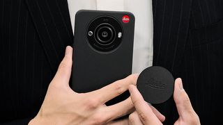 Two hands holding the Leica Leitz Phone 3