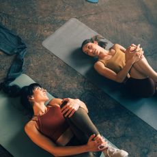 Lower back pain exercises: Two women stretching their backs