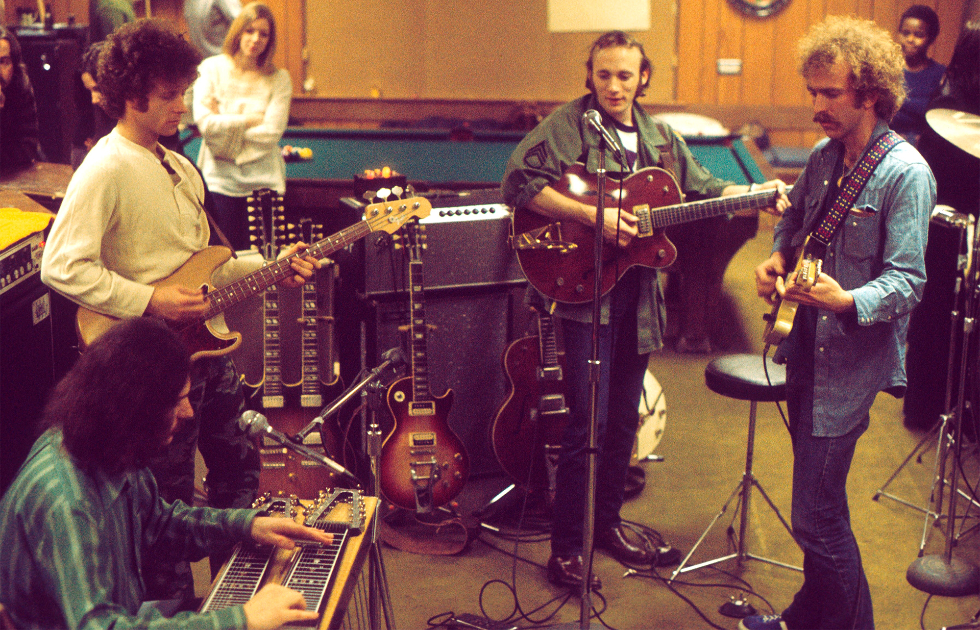 Stephen Stills and Manassas rehearsing at Brookfield House, Surrey in March, 1972. Al Perkins, Chris Hillman, Stephen Stills, Bernie Leadon sitting in.