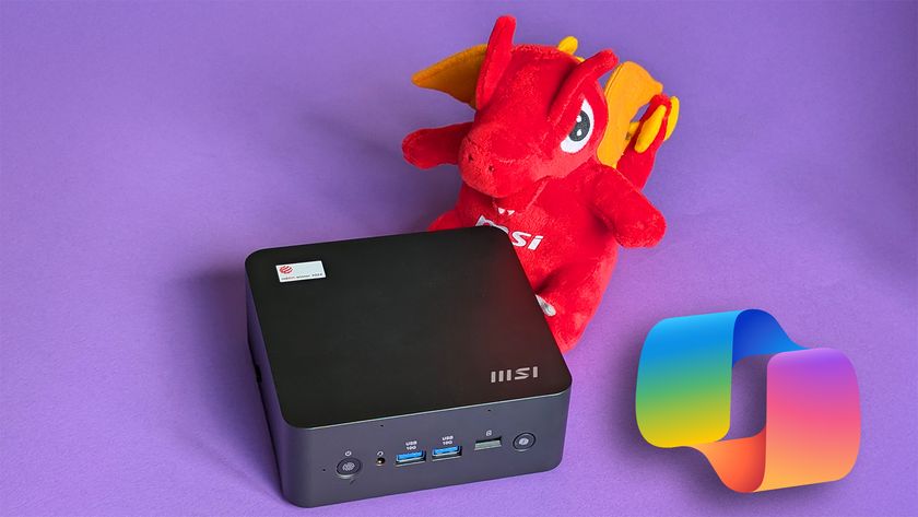 MSI Cubi NUC AI+ 2MG mini PC on a purple card stock background