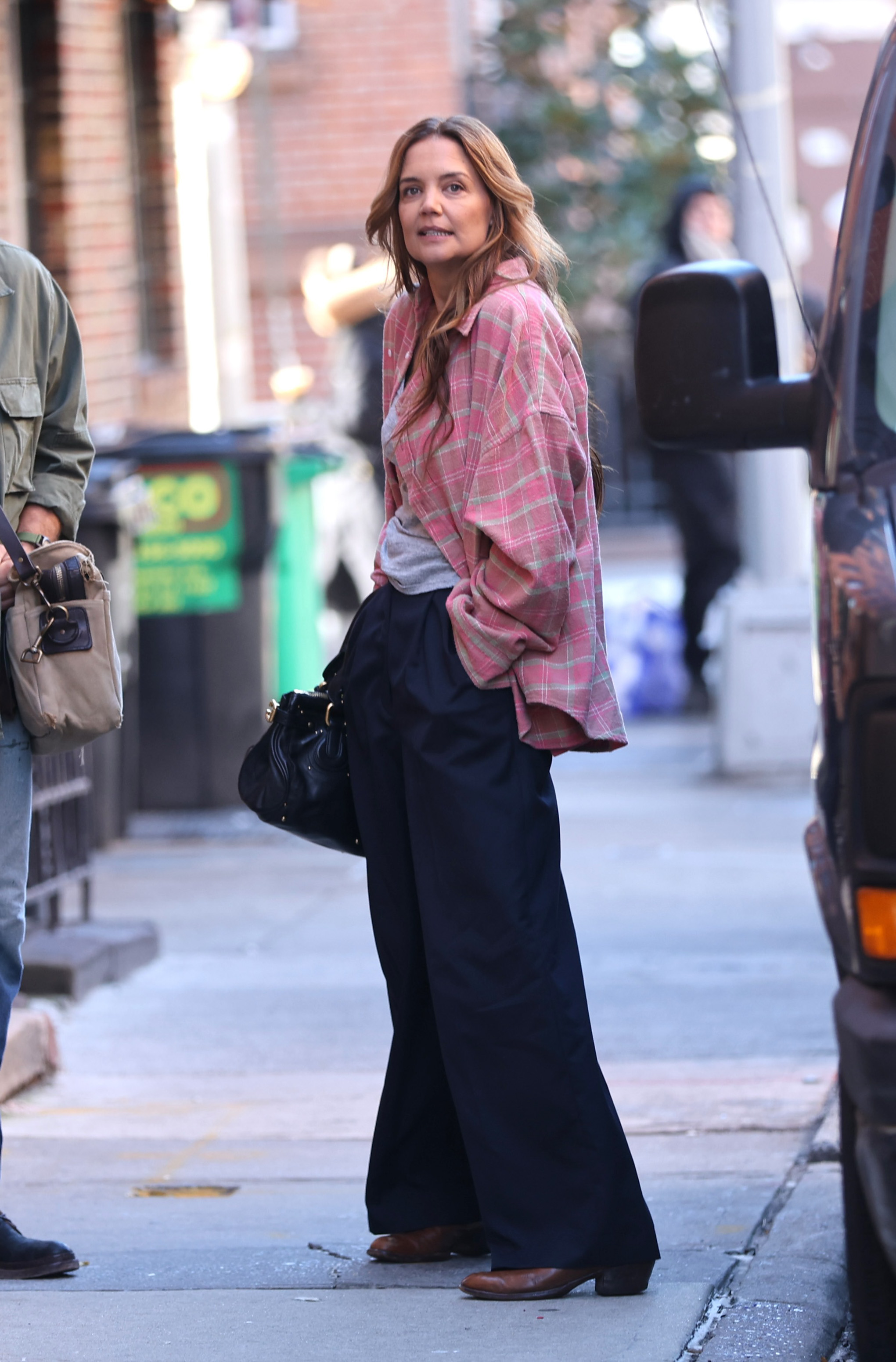 Katie Holmes is seen at the movie set of the 'Happy Hours' in the West Village, Manhattan on December 03, 2025 in New York City