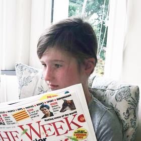 Rosamund reading The Week Junior