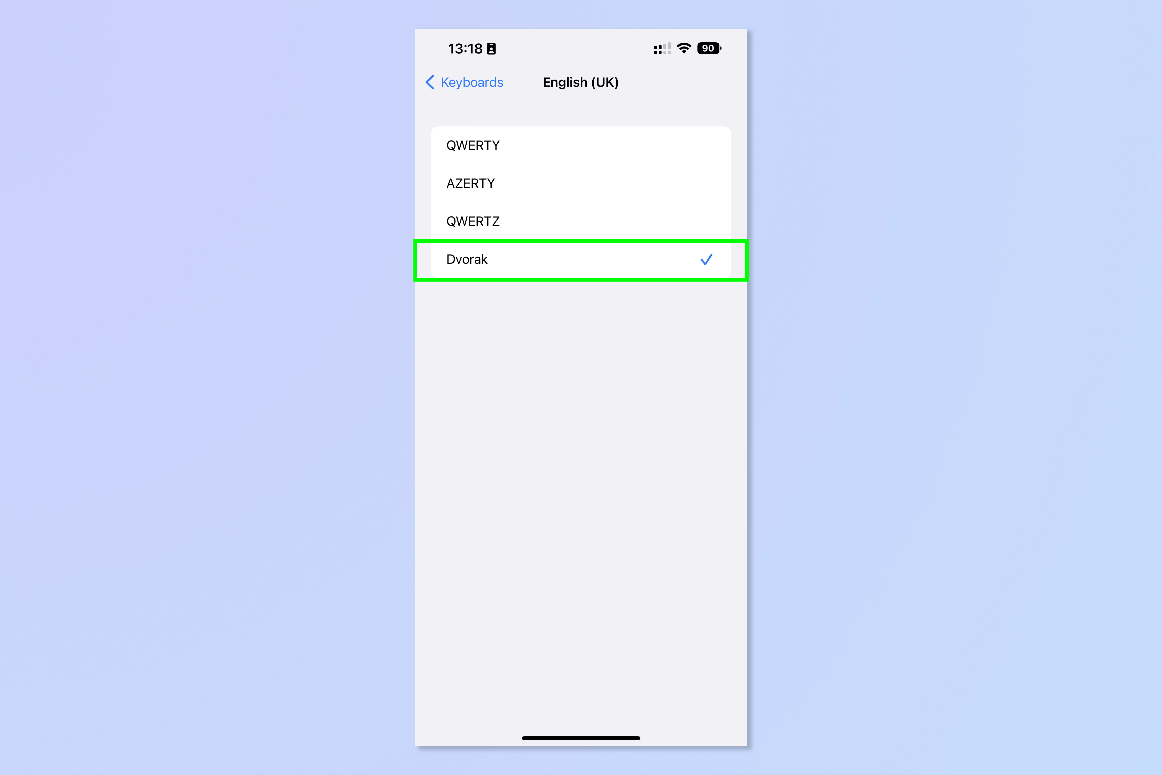 Una captura de pantalla que muestra los pasos necesarios para habilitar la distribución del teclado Dvorak en iPhone