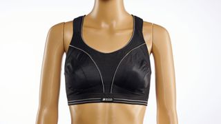 Mannequin wearing black shock absorber sports bra