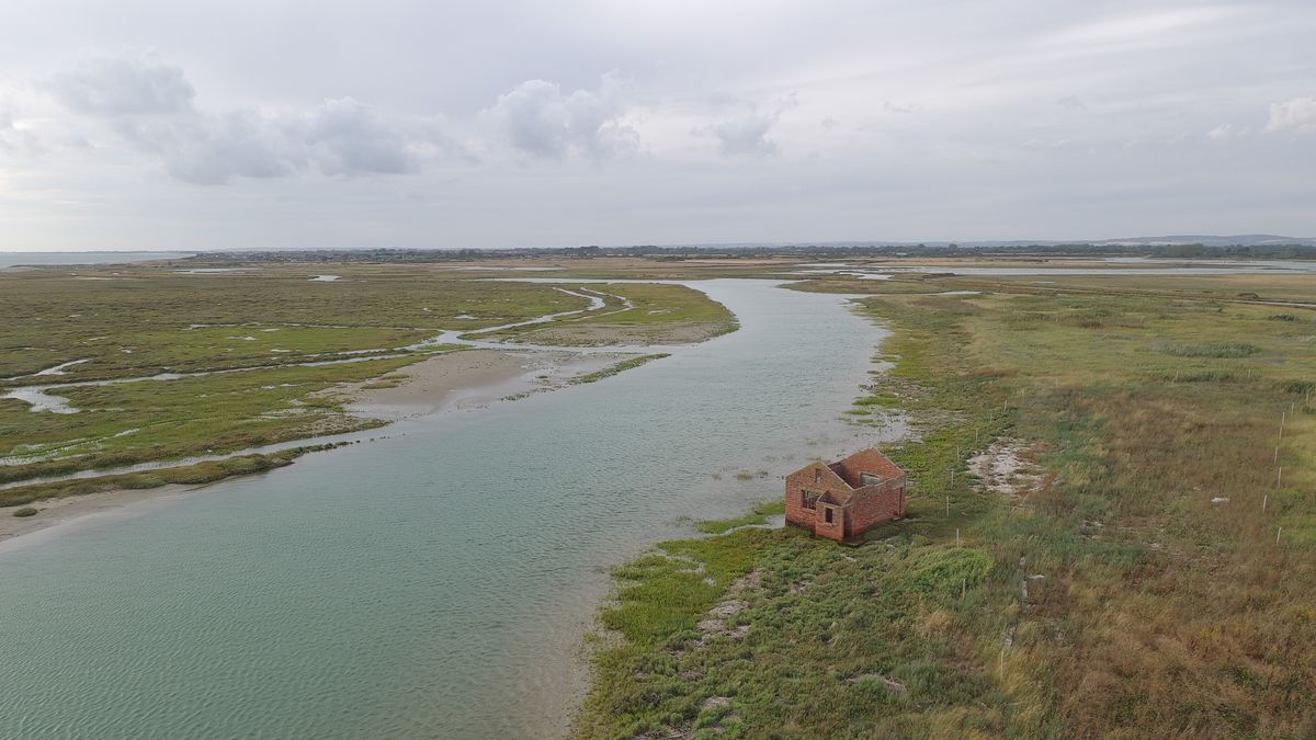 Aerial views of the South Coast of the UK on a cloudy day from a drone