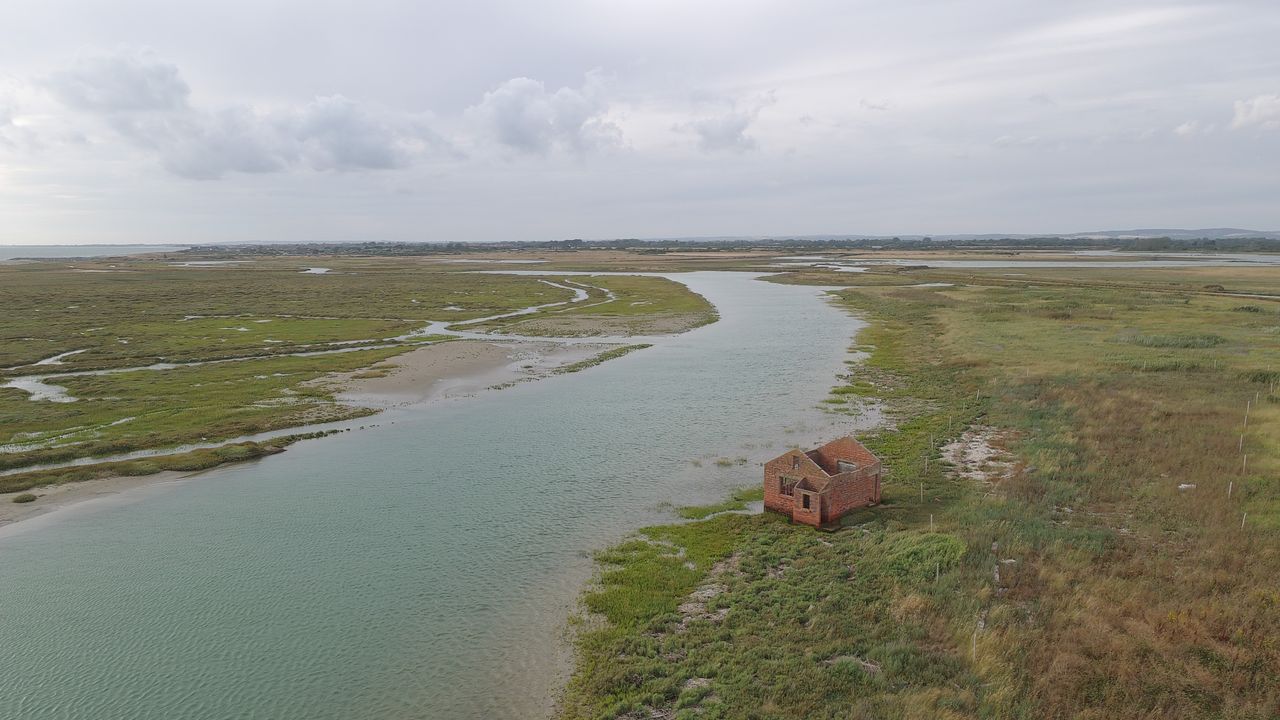 Aerial views of the South Coast of the UK on a cloudy day from a drone
