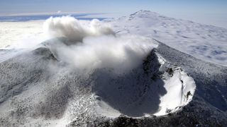 an aerial view of an Antarctic volcano