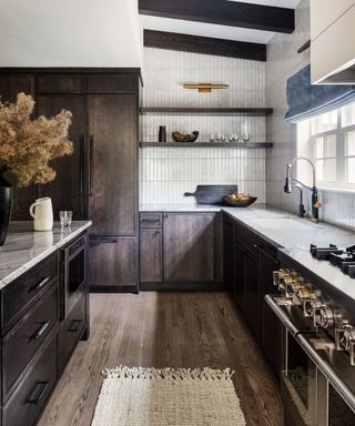 Ann Gottlieb kitchen with dark stained wood cabinets, photograph Angela Newton Roy