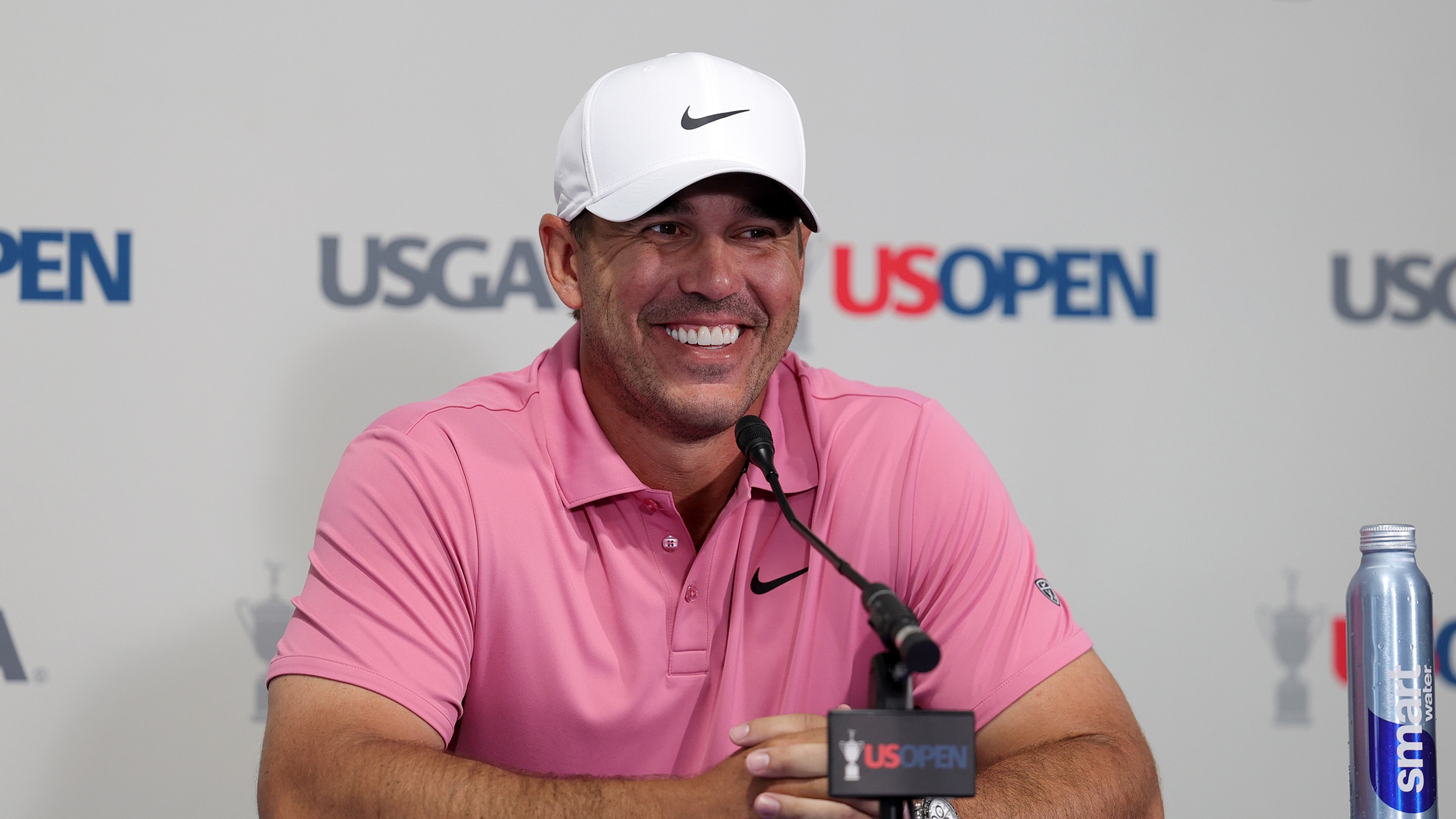Brooks Koepka talking with the media ahead of the 2026 US Open at Shinnecock Hills