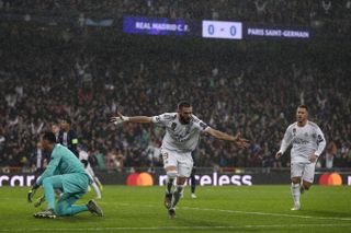 Real Madrid forward Karim Benzema scores