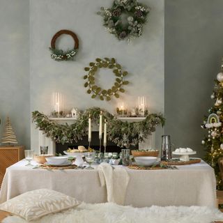 Green room with three wreaths on wall