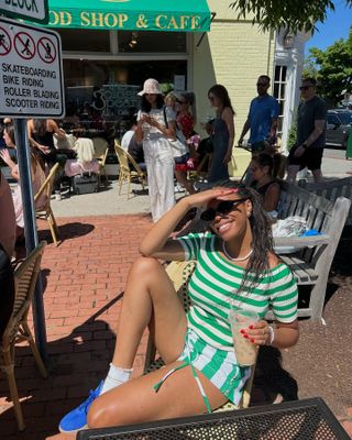 Sierra Mayhew wearing a striped top and striped shorts.