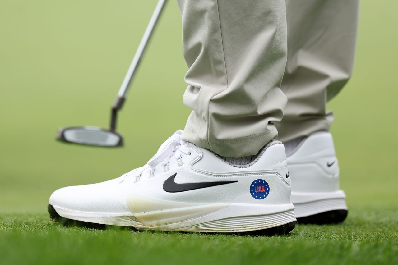 A close up of Scottie Scheffler's golf shoes