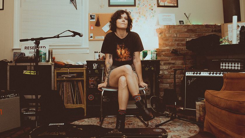 A photo of Lilly Hiatt sitting on a chair in her home studio in Nashville, where she recorded her 2025 album &#039;Forever.&#039;